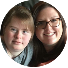 Picture of Emily Felter next to her sister, Sarah Felter, who is a white woman with long brown hair, glasses, and a large smile